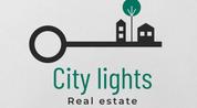 Adwa Al-Madinih Real Estate logo image
