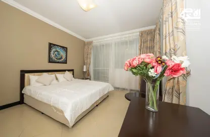 Room / Bedroom image for: Apartment - 2 Bedrooms - 2 Bathrooms for rent in Beverly Hills Tower - West Bay - West Bay - Doha, Image 1