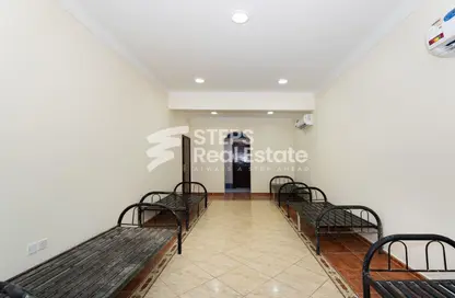 Villa - Studio - 6 Bathrooms for rent in Al Hanaa Street - Al Gharrafa - Doha