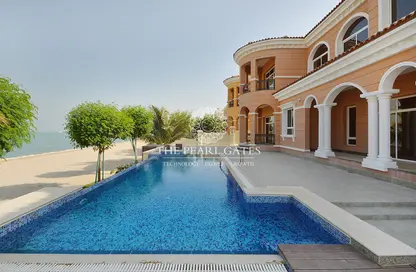 Pool image for: Villa - 6 Bedrooms - 7 Bathrooms for rent in La Plage - The Pearl Island - Doha, Image 1