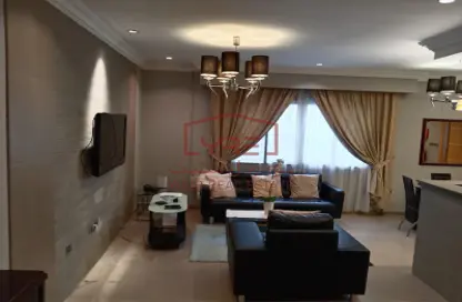 Living Room image for: Apartment - 1 Bedroom - 2 Bathrooms for rent in Al Zubair Bakkar Street - Al Sadd - Doha, Image 1