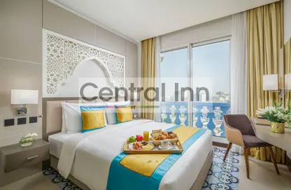 Room / Bedroom image for: Hotel Apartments - 1 Bedroom - 2 Bathrooms for rent in Central Inn Souq Waqif - Souq Waqif - Al Jasra - Doha, Image 1