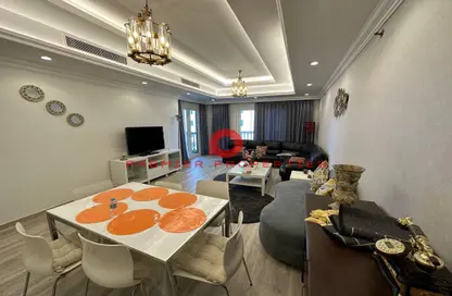Living / Dining Room image for: Apartment - 2 Bedrooms - 3 Bathrooms for sale in West Porto Drive - Porto Arabia - The Pearl Island - Doha, Image 1
