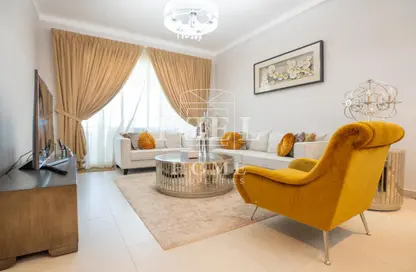 Living Room image for: Apartment - 2 Bedrooms - 3 Bathrooms for sale in Imperial Diamond - Viva Bahriyah - The Pearl Island - Doha, Image 1