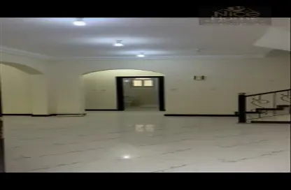 Empty Room image for: Villa - 5 Bedrooms - 4 Bathrooms for rent in Ain Khaled - Ain Khaled - Doha, Image 1