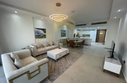 Living / Dining Room image for: Apartment - 1 Bedroom - 1 Bathroom for sale in Burj Al Marina - Marina District - Lusail, Image 1