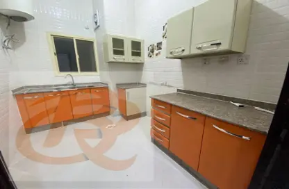 Kitchen image for: Apartment - 2 Bedrooms - 2 Bathrooms for rent in Tadmur Street - Old Airport Road - Doha, Image 1