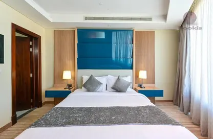 Room / Bedroom image for: Hotel Apartments - 1 Bedroom - 1 Bathroom for rent in Al Mansoura - Al Mansoura - Doha, Image 1