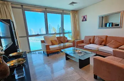 صورة لـ غرفة المعيشة شقة - 2 غرف نوم - 4 حمامات للايجار في برج زجزاج  ا - أبراج زجزاج - الخليج الغربي - الدوحة ، صورة رقم 1
