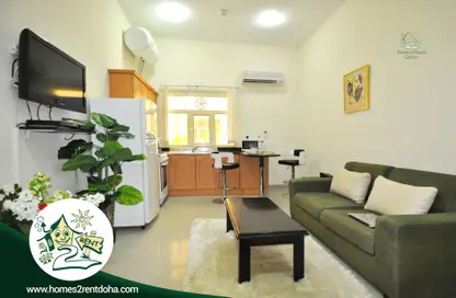 Living Room image for: Apartment - 2 Bedrooms - 2 Bathrooms for rent in Al Dafna - Al Dafna - Doha, Image 1