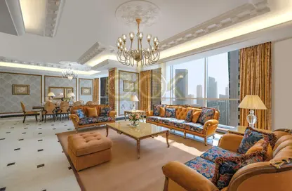 Living Room image for: Duplex - 3 Bedrooms - 4 Bathrooms for rent in West Bay Tower - West Bay - West Bay - Doha, Image 1