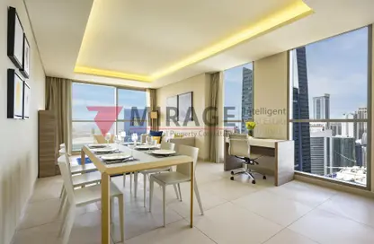 Living / Dining Room image for: Apartment - 2 Bedrooms - 2 Bathrooms for rent in West Bay - Doha, Image 1