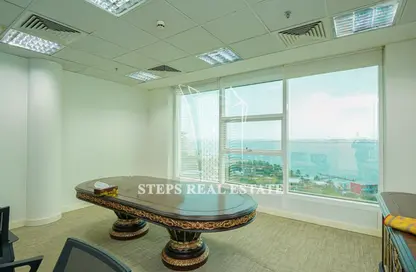 Living Room image for: Office Space - Studio - 1 Bathroom for rent in West Bay Tower - West Bay - West Bay - Doha, Image 1
