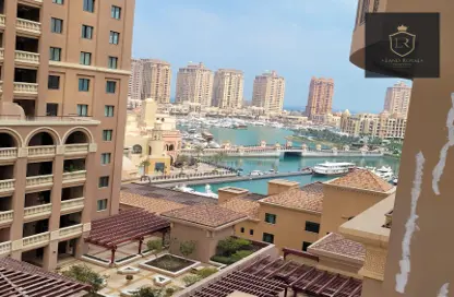 Outdoor Building image for: Apartment - 2 Bedrooms - 3 Bathrooms for rent in East Porto Drive - Porto Arabia - The Pearl Island - Doha, Image 1