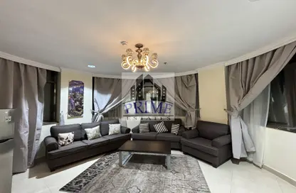 Living Room image for: Apartment - 1 Bedroom - 2 Bathrooms for rent in Najma Street - Najma - Doha, Image 1