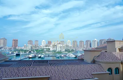 Apartment - 2 Bedrooms - 3 Bathrooms for sale in Porto Arabia - The Pearl Island - Doha