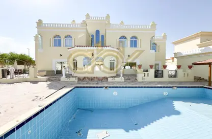 Villa - 5 Bedrooms - 7+ Bathrooms for sale in Onaiza Street - Diplomatic Area - Doha