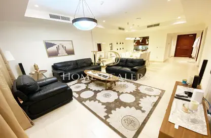 Living Room image for: Apartment - 1 Bedroom - 2 Bathrooms for sale in West Porto Drive - Porto Arabia - The Pearl Island - Doha, Image 1