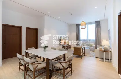 Living / Dining Room image for: Apartment - 2 Bedrooms - 2 Bathrooms for rent in Regency Business Center 2 - Regency Business Center 2 - Corniche Road - Doha, Image 1