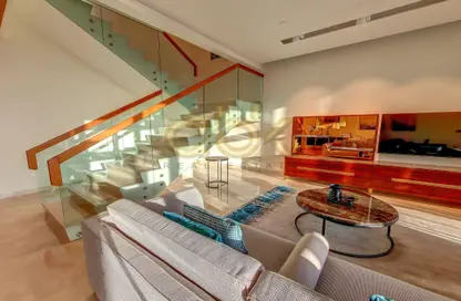 Living Room image for: Duplex - 3 Bedrooms - 4 Bathrooms for rent in Musheireb Tower - Musheireb - Musheireb - Doha, Image 1