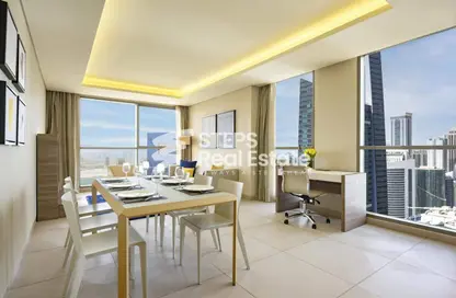 Living / Dining Room image for: Apartment - 2 Bedrooms - 2 Bathrooms for rent in Al Shatt Street - West Bay - Doha, Image 1