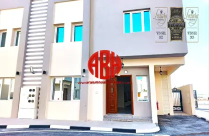 مجمع سكني - 7 غرف نوم - 7 حمامات للايجار في شارع عنيزة - الحي الدبلوماسي - الدوحة