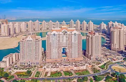 Outdoor Building image for: Apartment - 3 Bedrooms - 4 Bathrooms for sale in Tower 29 - Viva Bahriyah - The Pearl Island - Doha, Image 1