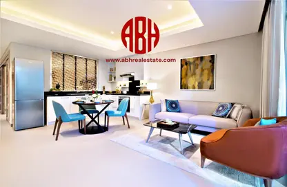 Living / Dining Room image for: Apartment - 1 Bedroom - 1 Bathroom for rent in Abraj Bay - Abraj Quartiers - The Pearl Island - Doha, Image 1