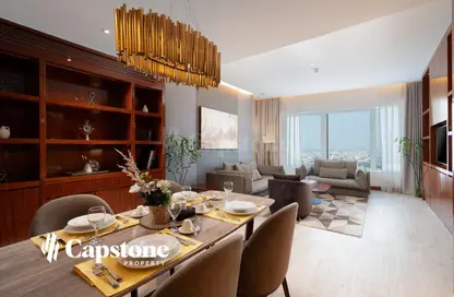 Living / Dining Room image for: Hotel Apartments - 2 Bedrooms - 3 Bathrooms for rent in West Bay Tower - West Bay - West Bay - Doha, Image 1