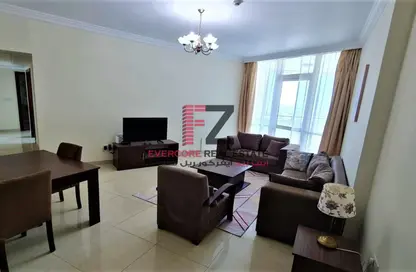 Living / Dining Room image for: Apartment - 2 Bedrooms - 3 Bathrooms for rent in West Bay - West Bay - Doha, Image 1