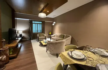 صورة لـ غرفة المعيشة / غرفة الطعام شقة - غرفة نوم - 1 حمام للايجار في شارع نجمه - نجمة - الدوحة ، صورة رقم 1