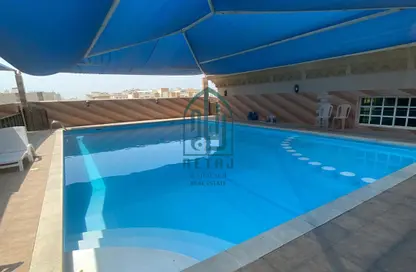 صورة لـ حوض سباحة شقة - 2 غرف نوم - 2 حمامات للايجار في أم غويلينا 4 - أم غويلينا - الدوحة ، صورة رقم 1
