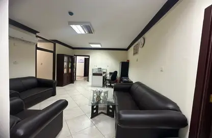 Living Room image for: Office Space - Studio - 3 Bathrooms for rent in Souk Al gharaffa - Al Gharrafa - Doha, Image 1