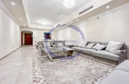 صورة لـ غرفة المعيشة شقة - 2 غرف نوم - 3 حمامات للايجار في طريق بورتو الغربي - بورتو أرابيا - جزيرة اللؤلؤة - الدوحة ، صورة رقم 1
