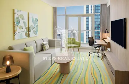 Living Room image for: Apartment - 2 Bedrooms - 2 Bathrooms for rent in West Bay Tower - West Bay - West Bay - Doha, Image 1