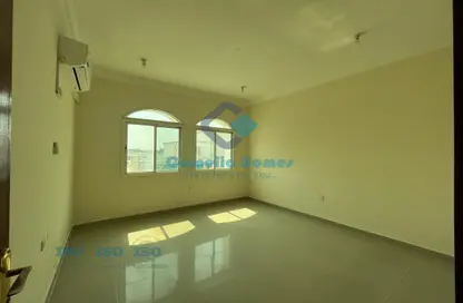 Empty Room image for: Compound - 4 Bedrooms - 5 Bathrooms for rent in Ain Khaled - Ain Khaled - Doha, Image 1