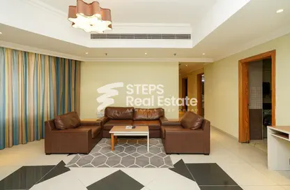 Living Room image for: Apartment - 3 Bedrooms - 3 Bathrooms for rent in Al Shatt Street - West Bay - Doha, Image 1