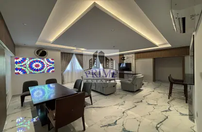 Living / Dining Room image for: Apartment - 2 Bedrooms - 2 Bathrooms for rent in Bin Dirham Plaza - B-Ring Road - Doha, Image 1