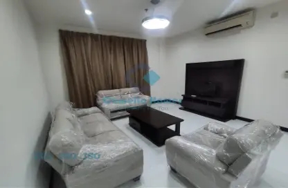 صورة لـ غرفة المعيشة شقة - 3 غرف نوم - 3 حمامات للايجار في المنصورة - المنصورة - الدوحة ، صورة رقم 1