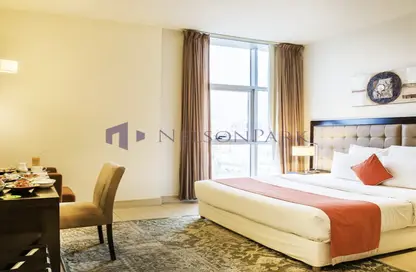 Room / Bedroom image for: Apartment - 1 Bedroom - 1 Bathroom for rent in Corniche Road - Corniche Road - Doha, Image 1