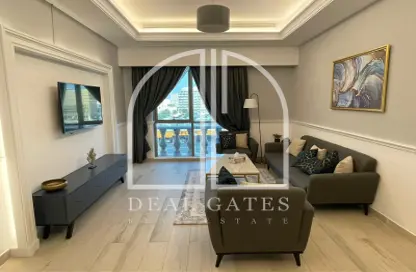 Living Room image for: Apartment - 1 Bedroom - 2 Bathrooms for sale in Al Sadd Road - Al Sadd - Doha, Image 1