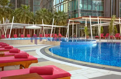 Apartment - 1 Bedroom - 2 Bathrooms for rent in Tower 2 - The Gate Mall - West Bay - Doha