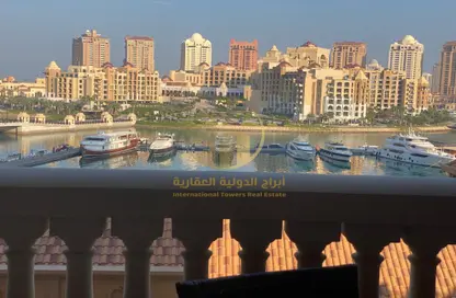 Balcony image for: Apartment - 2 Bedrooms - 3 Bathrooms for sale in Tower 5 - Porto Arabia - The Pearl Island - Doha, Image 1