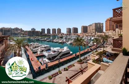 Water View image for: Apartment - 2 Bedrooms - 3 Bathrooms for rent in Porto Arabia Townhouses - Porto Arabia - The Pearl Island - Doha, Image 1