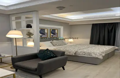 Room / Bedroom image for: Apartment - 1 Bathroom for rent in Bin Al Sheikh Towers - Al Mirqab Al Jadeed - Doha, Image 1