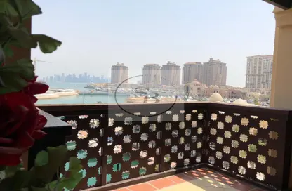 Balcony image for: Townhouse - 2 Bedrooms - 3 Bathrooms for rent in Tower 7 (Ferrari Tower) - Porto Arabia - The Pearl Island - Doha, Image 1