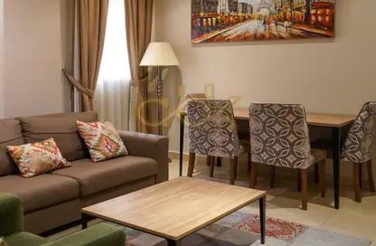 Living / Dining Room image for: Apartment - 1 Bedroom - 2 Bathrooms for rent in Hadramout Street - Doha Al Jadeed - Doha, Image 1