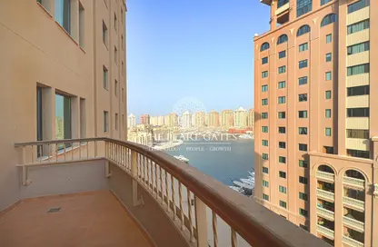 صورة لـ شرفة شقة - 2 غرف نوم - 3 حمامات للبيع في طريق بورتو الشرقي - بورتو أرابيا - جزيرة اللؤلؤة - الدوحة ، صورة رقم 1