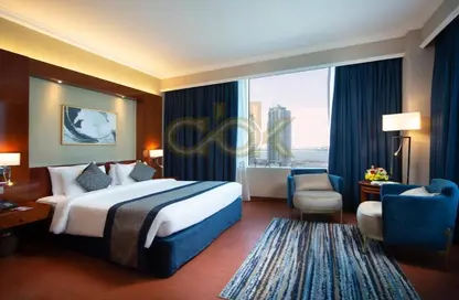 Room / Bedroom image for: Apartment - 1 Bedroom - 1 Bathroom for rent in West Bay Tower - West Bay - West Bay - Doha, Image 1