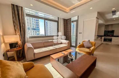 Living Room image for: Apartment - 1 Bedroom - 2 Bathrooms for rent in Lusail Residence - Marina District - Lusail, Image 1